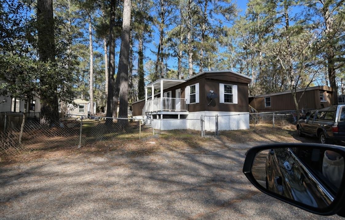 2100 Legrand Road Columbia, SC 29223 - Photo 3 of 18 View of front of house with a fenced front yard and a gate