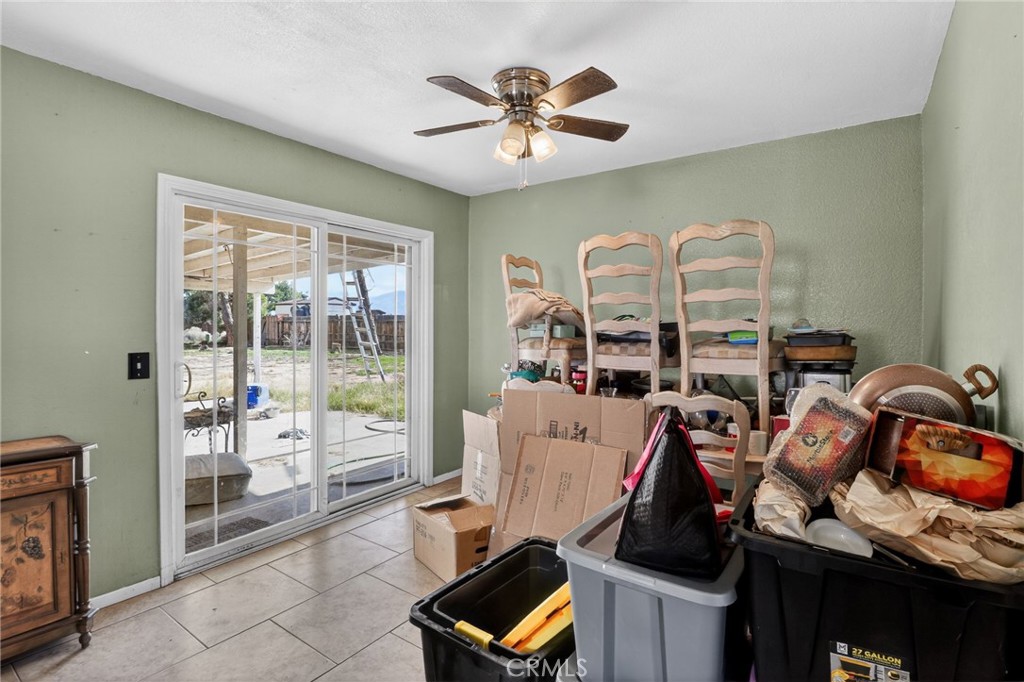21985 Maumee Road Apple Valley, CA 92308 - Photo 10 of 30 a room with furniture and ceiling fan
