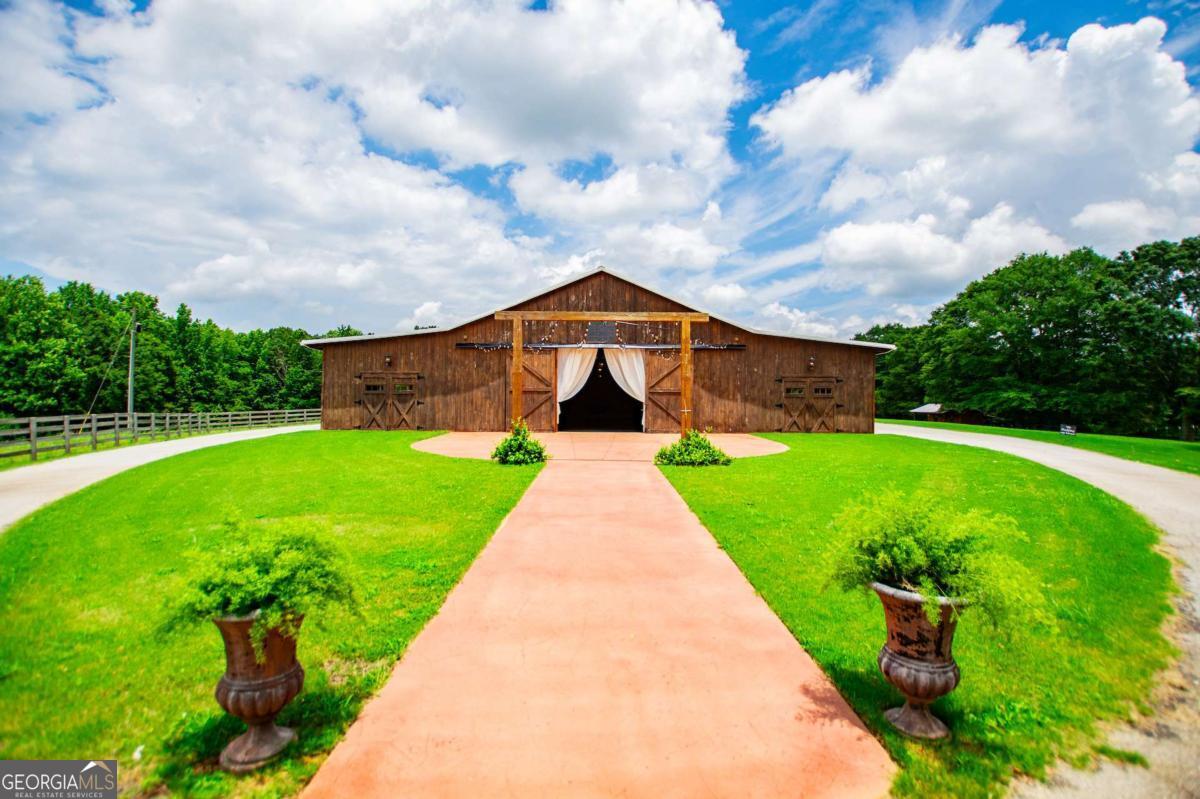 1074 Glenloch Road Roopville, GA 30170 - Photo 51 of 98 a view of a garden with potted plants
