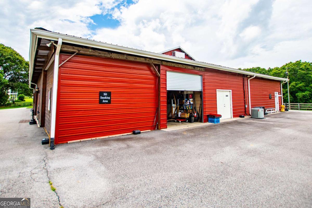 1074 Glenloch Road Roopville, GA 30170 - Photo 57 of 98 a view of outdoor space and front view of a house