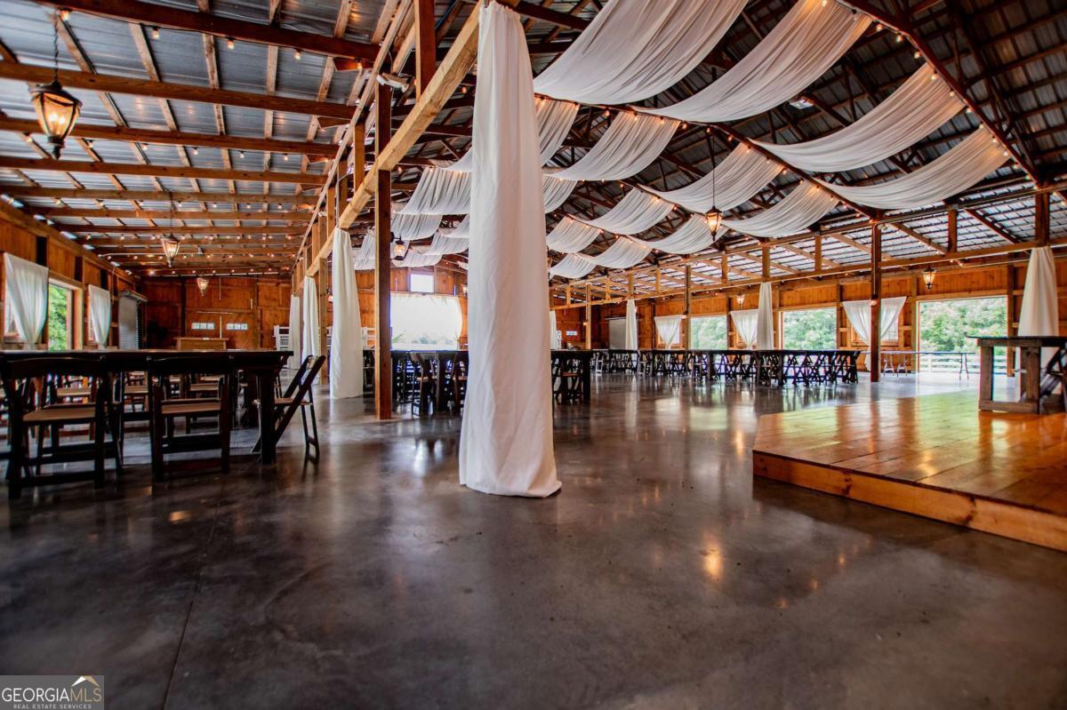 1074 Glenloch Road Roopville, GA 30170 - Photo 59 of 98 a view of a swimming pool with a porch