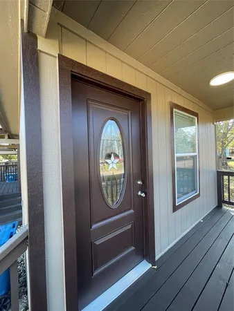 a view of entryway with wooden floor
