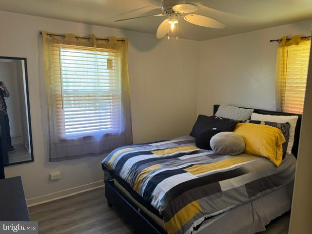 4603 Raleigh Road Temple Hills, MD 20748 - Photo 33 of 40 a bedroom with a bed and window