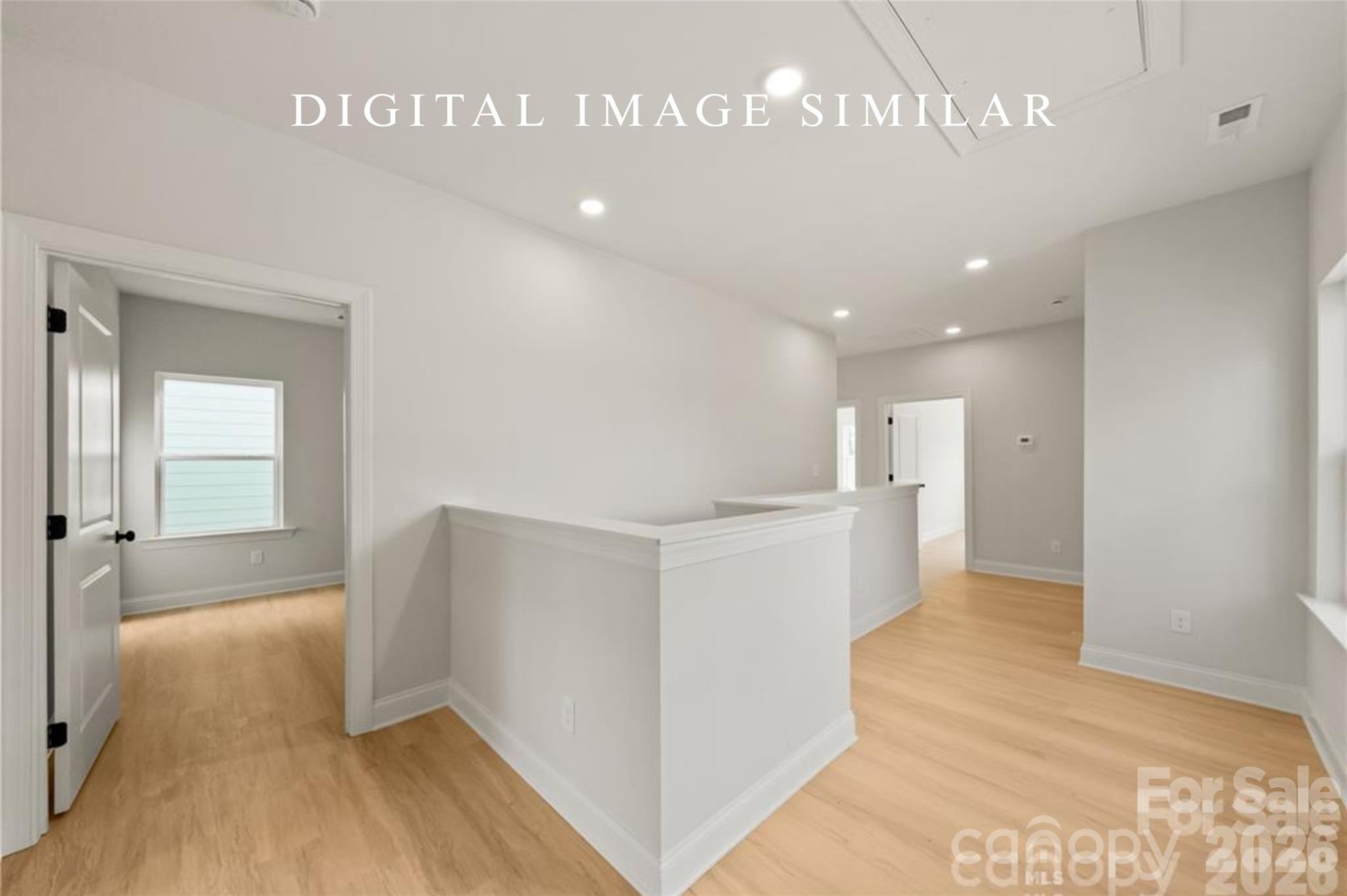 2928 Mulberry Church Road Charlotte, NC 28208 - Photo 24 of 43 a view of a hallway with wooden floor