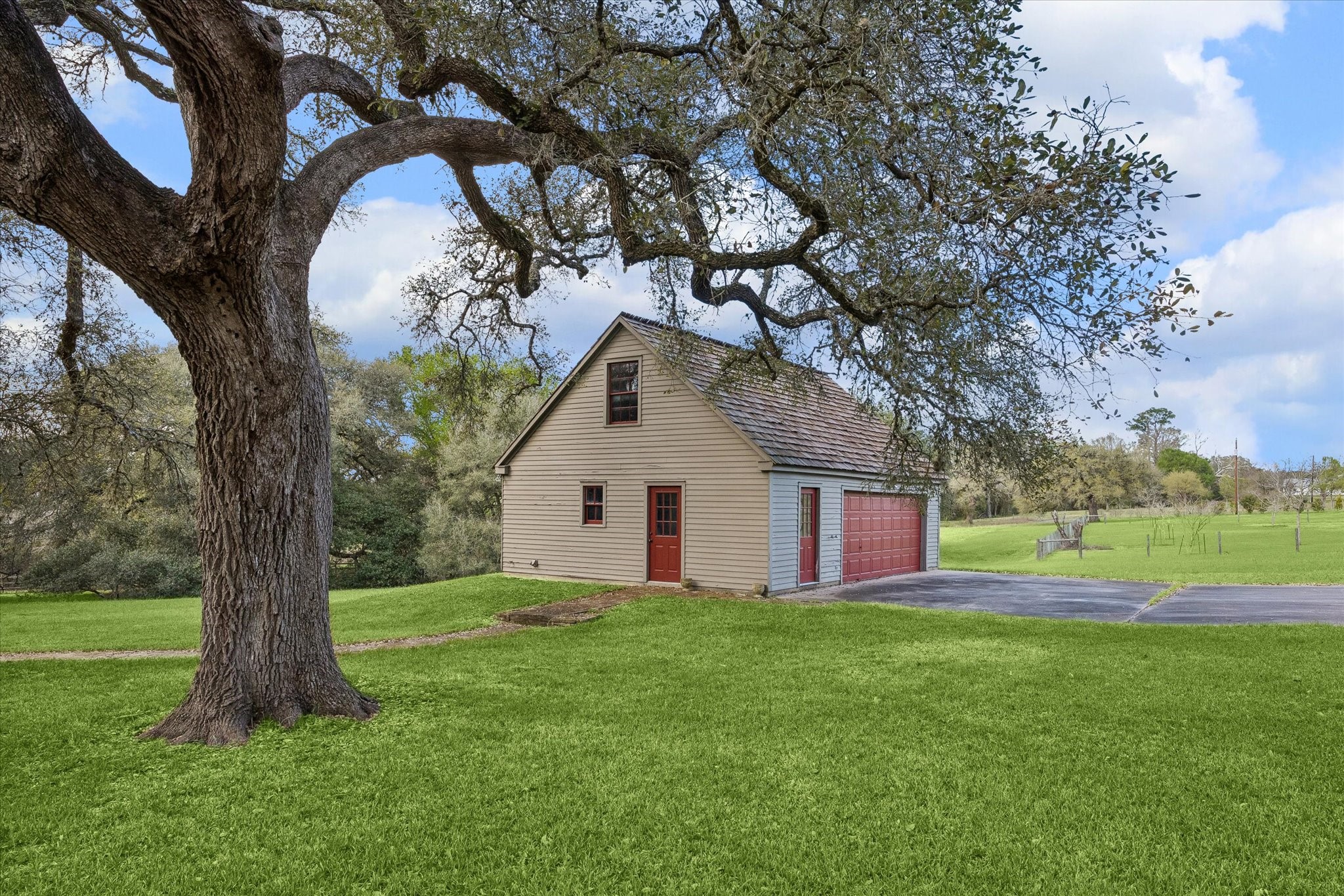 207 Bauer Rummel Round Top, TX 78954 - Photo 5 of 21 Separate 2-car garage with Utility Room (Also space for stackable washer/dryer in the bathroom. Nice attic space that could be built out.
