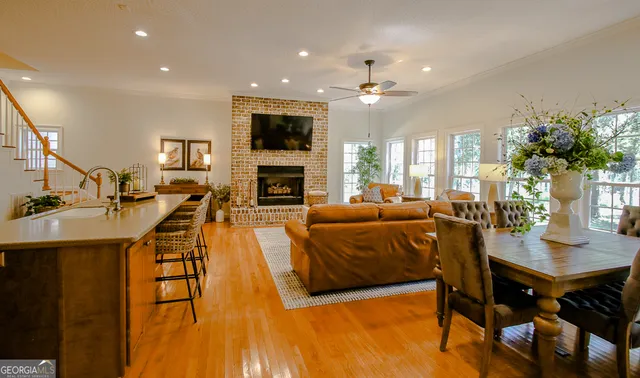 a white toilet sitting next to a white tub