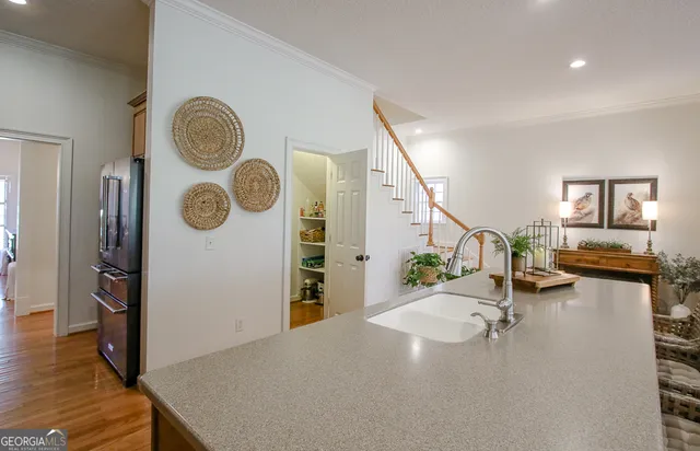 a spacious bedroom with a bed and a television in it