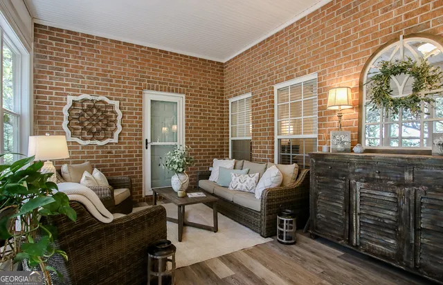 a bathroom with a toilet and a shower curtain