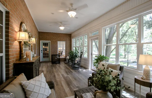 a view of a swimming pool with some trees