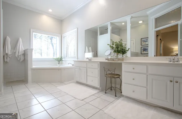 a backyard of a house with lots of green space and fountain