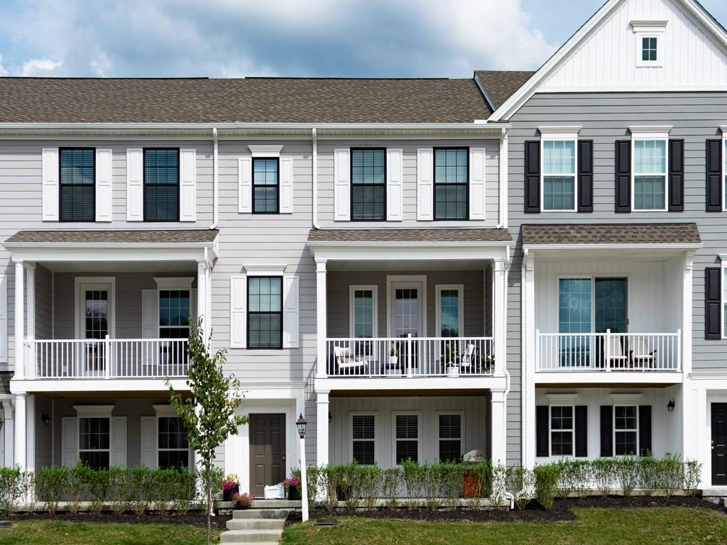 a front view of residential houses