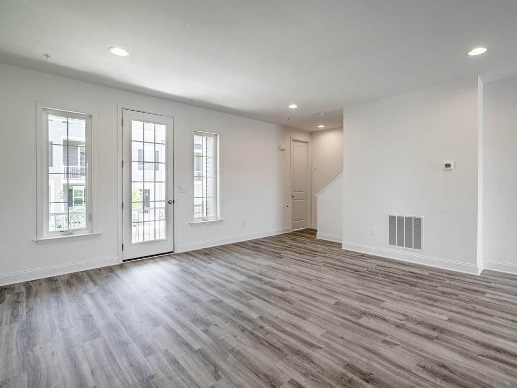 122 Gress Road Cranberry Township, PA 16066 - Photo 14 of 25 a view of an empty room with wooden floor and a window