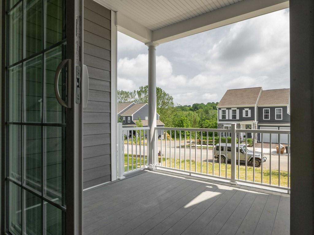 122 Gress Road Cranberry Township, PA 16066 - Photo 17 of 25 a view of a balcony with floor to ceiling windows