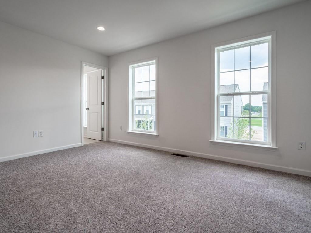 122 Gress Road Cranberry Township, PA 16066 - Photo 18 of 25 an empty room with windows and closet