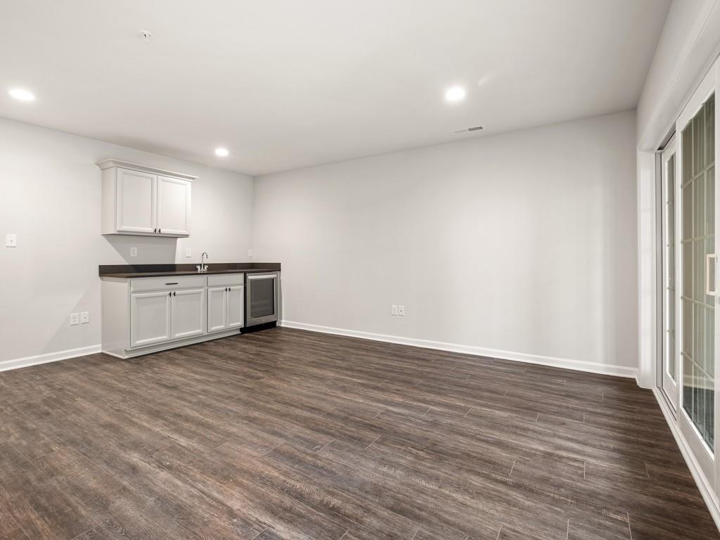 122 Gress Road Cranberry Township, PA 16066 - Photo 21 of 25 a view of kitchen with wooden floor electronic appliances and window