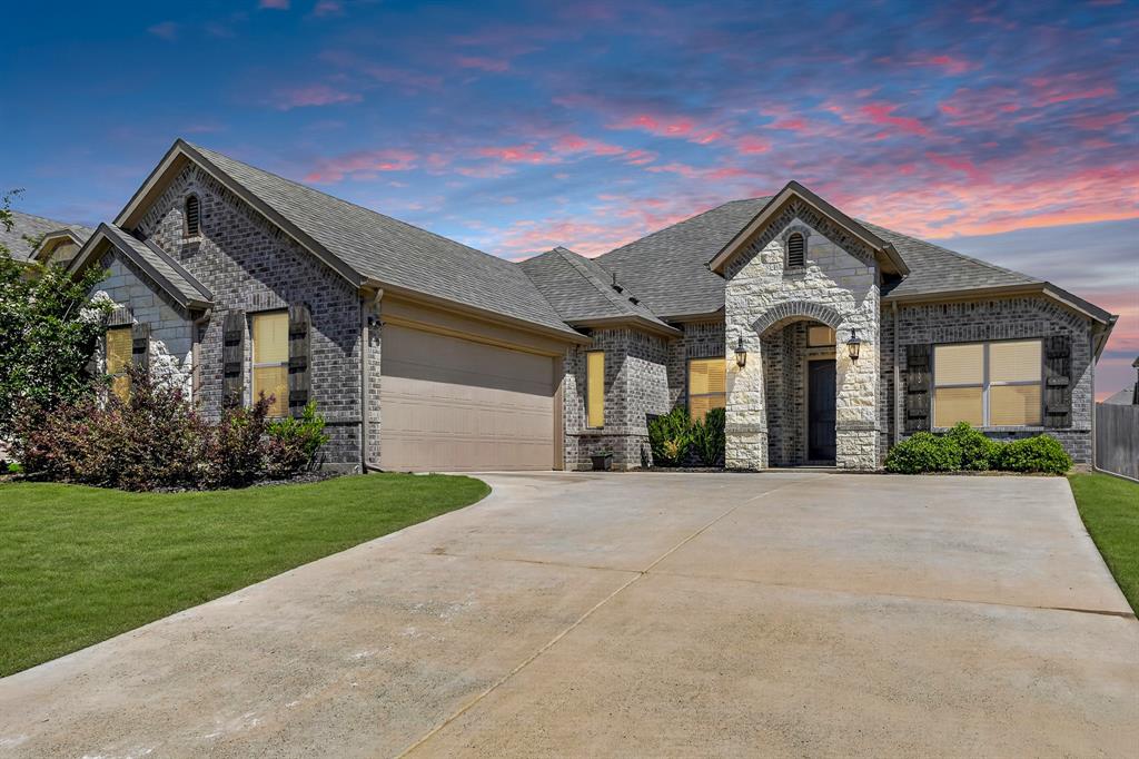 136 Gleeson Drive Red Oak, TX 75154 - Photo 1 of 40 a front view of a house with a yard