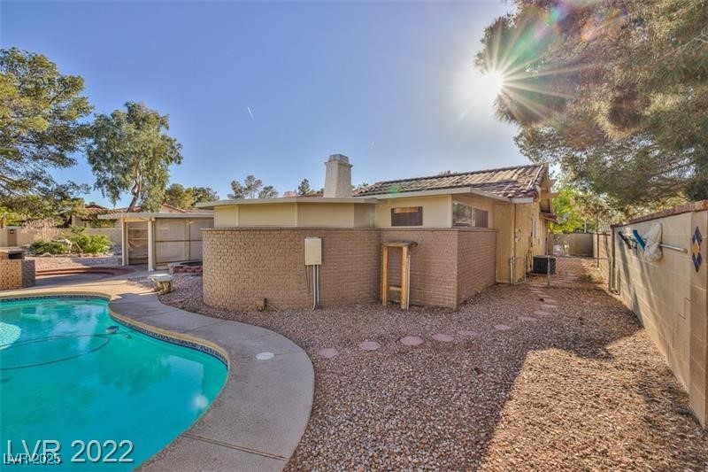 2249 Darwin Circle Henderson, NV 89014 - Photo 22 of 24 View of pool with a fenced backyard