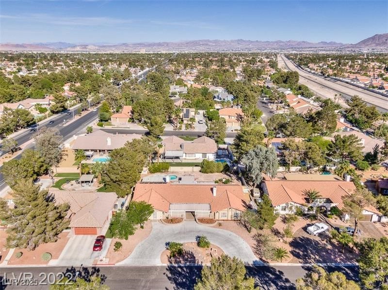 2249 Darwin Circle Henderson, NV 89014 - Photo 23 of 24 Aerial view of residential area with a mountainous background