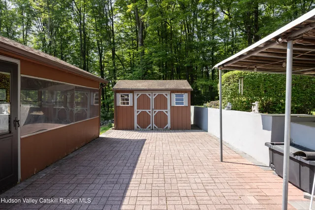 a view of a back yard from a balcony