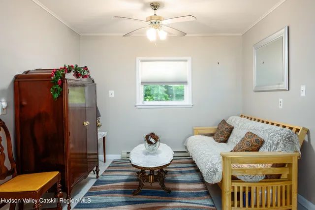 a living room with furniture and a table