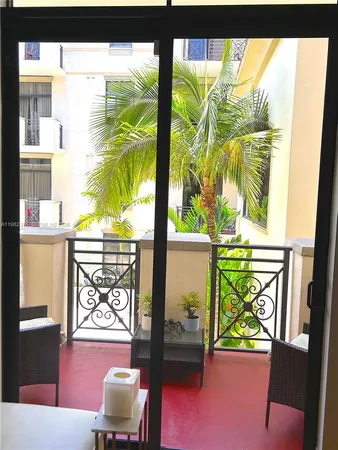 a view of a living room and a window