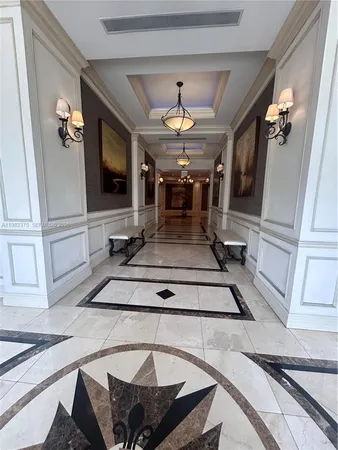 a view of swimming pool with seating area