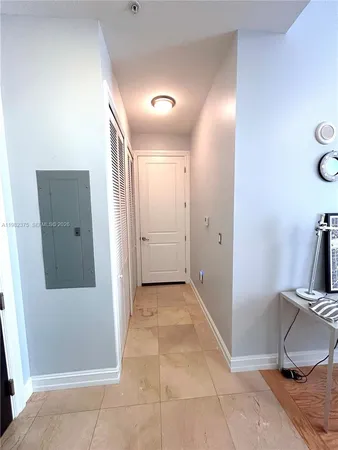 a view of a hallway with closet