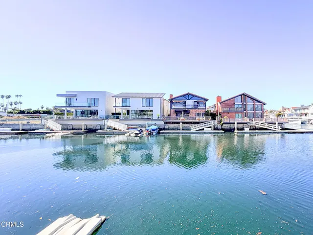 a view of a lake with a house