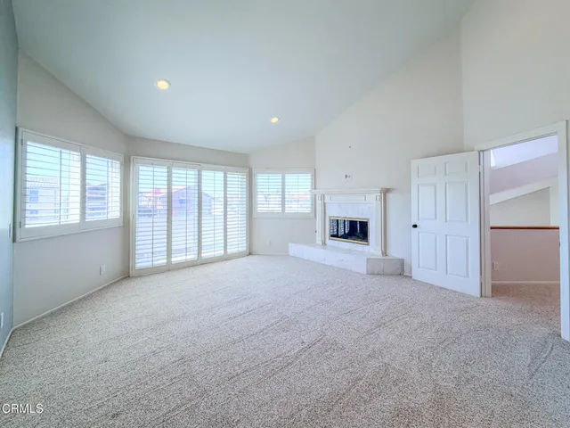 a view of livingroom with furniture and window