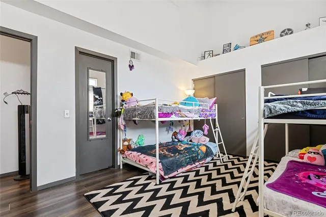 a kitchen with stainless steel appliances granite countertop a stove and a refrigerator