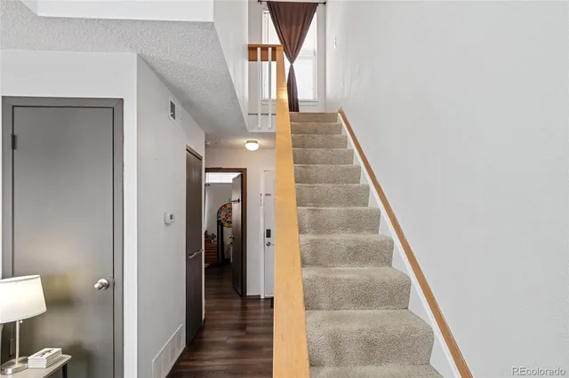 a bathroom with a shower and toilet