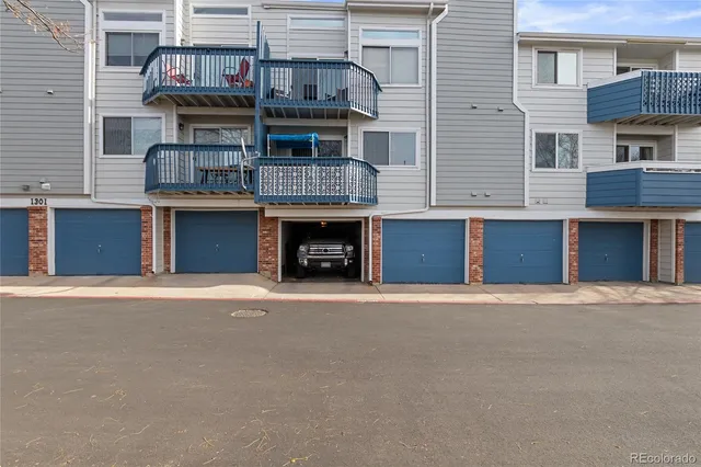 a front view of a house with a garage