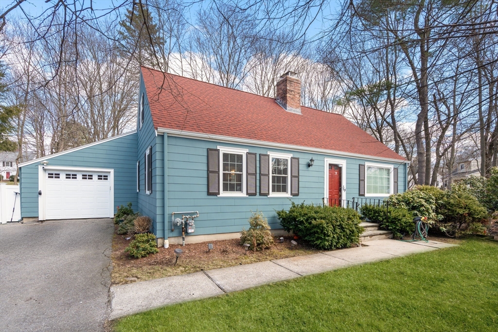 339 Weston Road Wellesley, MA 02481 - Photo 1 of 32 a front view of a house with a yard and potted plants