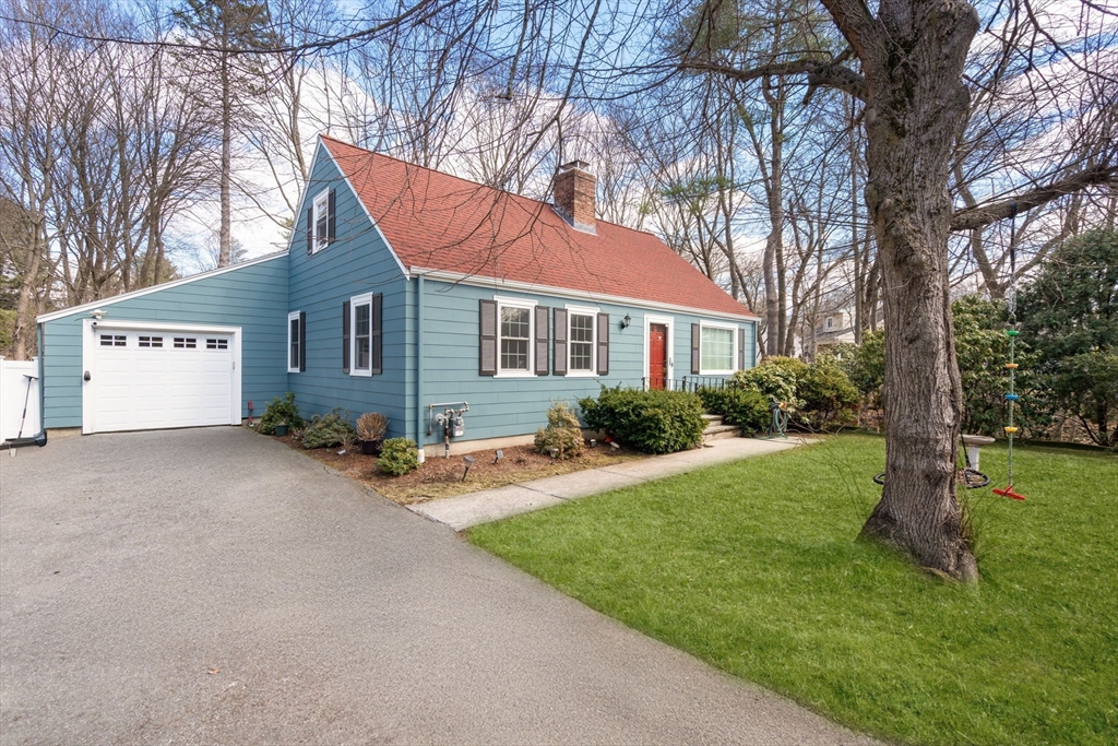 339 Weston Road Wellesley, MA 02481 - Photo 2 of 32 a view of a house with a yard and large tree