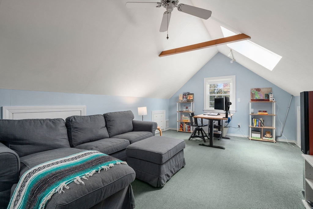 339 Weston Road Wellesley, MA 02481 - Photo 22 of 32 a living room with furniture and a window