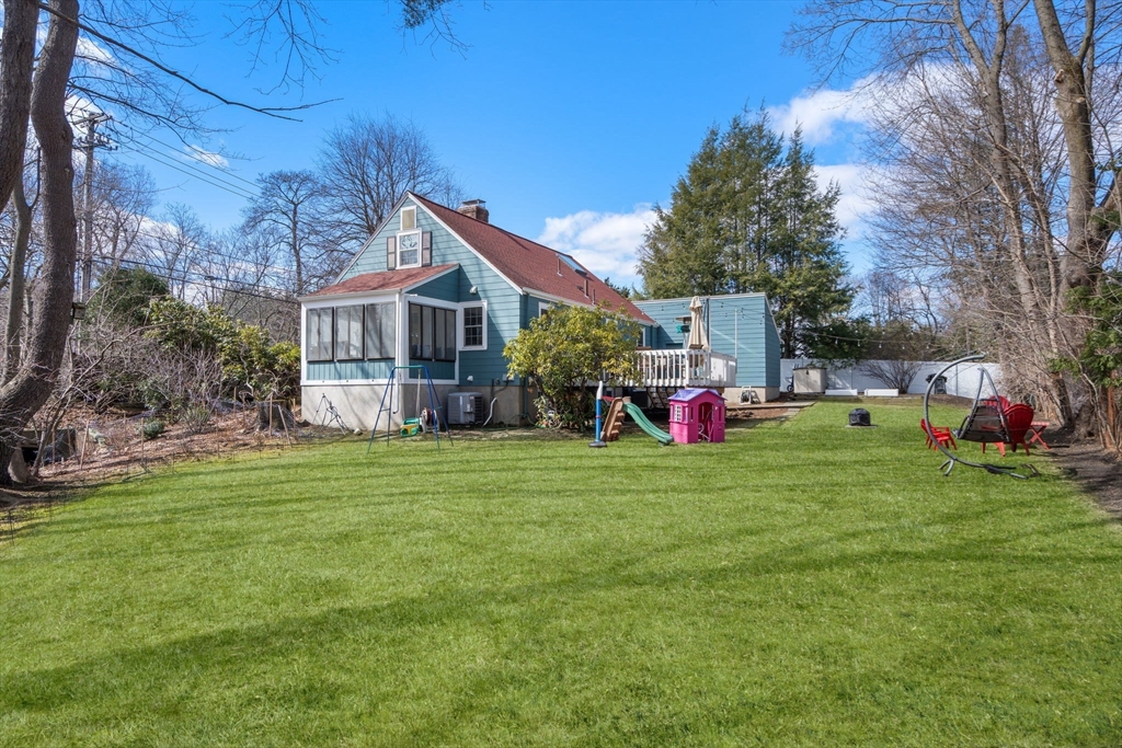 339 Weston Road Wellesley, MA 02481 - Photo 30 of 32 a view of a house with a back yard