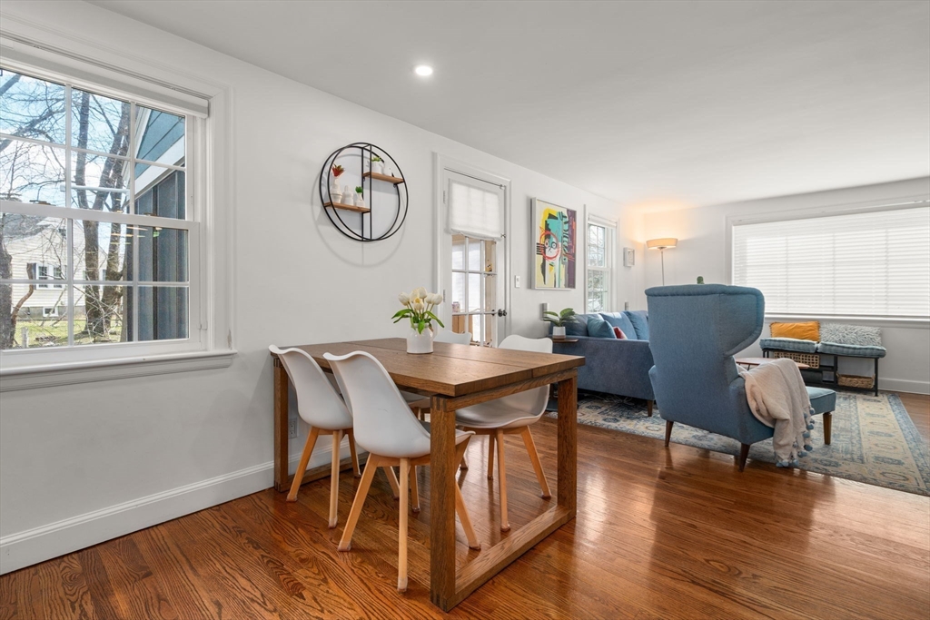 339 Weston Road Wellesley, MA 02481 - Photo 8 of 32 a view of a dining room with furniture window and wooden floor