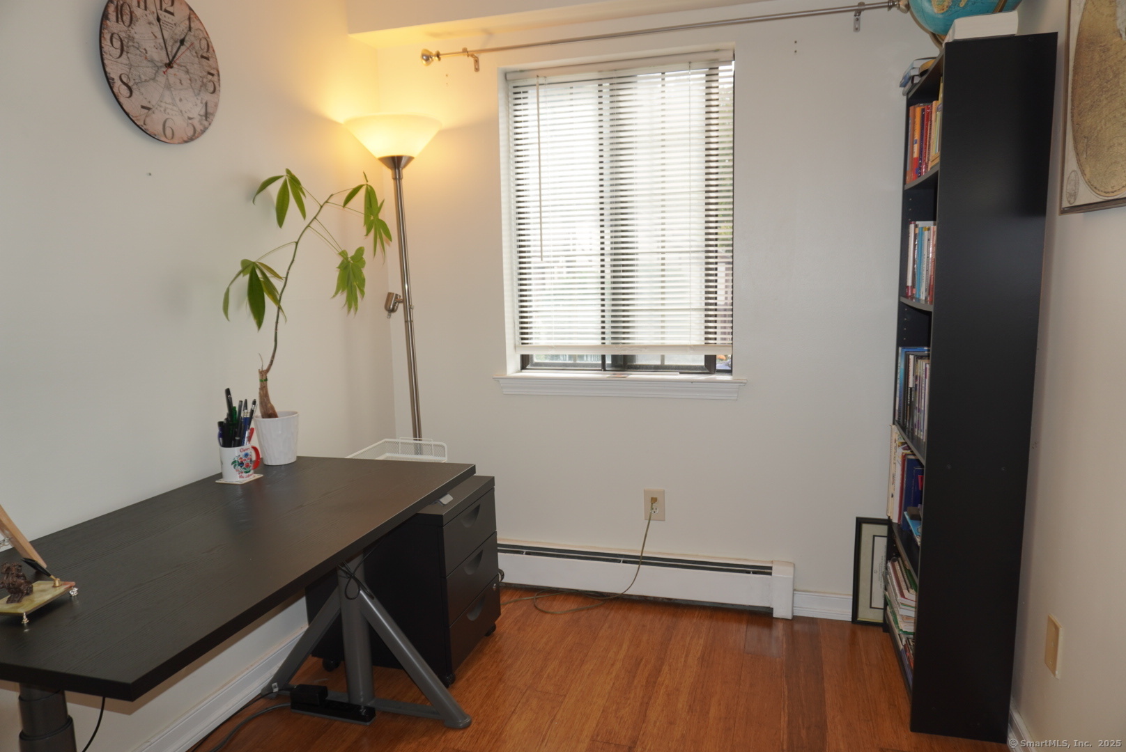 450 Swanson Crescent, Unit 450 Milford, CT 06461 - Photo 5 of 9 a view of a workspace with furniture and a window