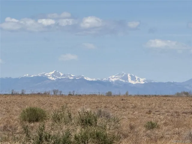 a view of an outdoor space and mountain view