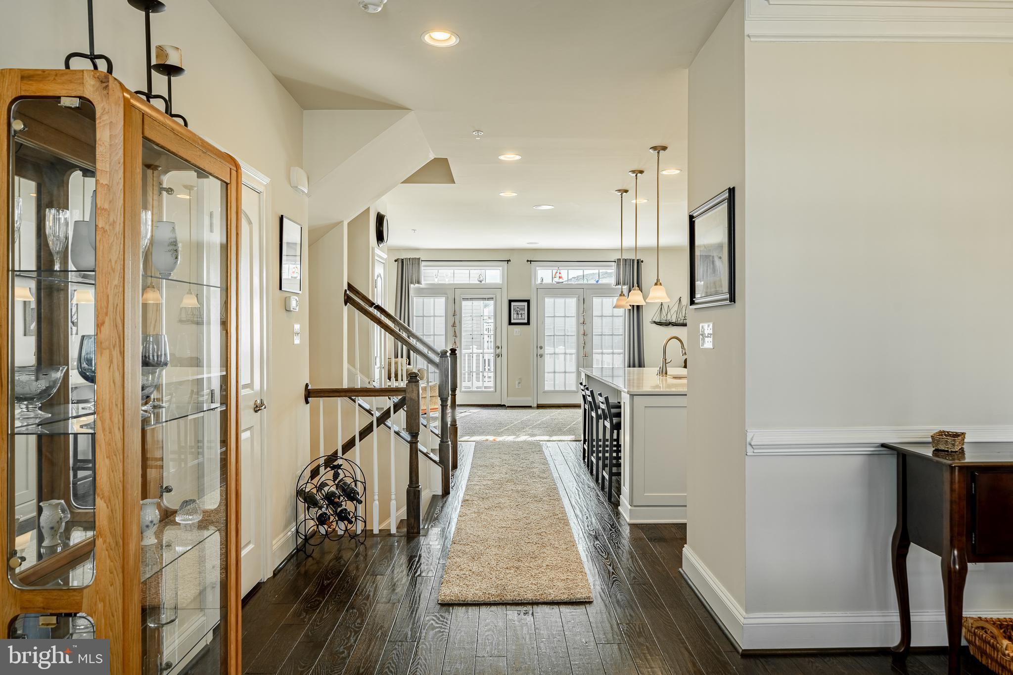 408 Atwater Drive Malvern, PA 19355 - Photo 11 of 49 a view of hallway with wooden floor and staircase
