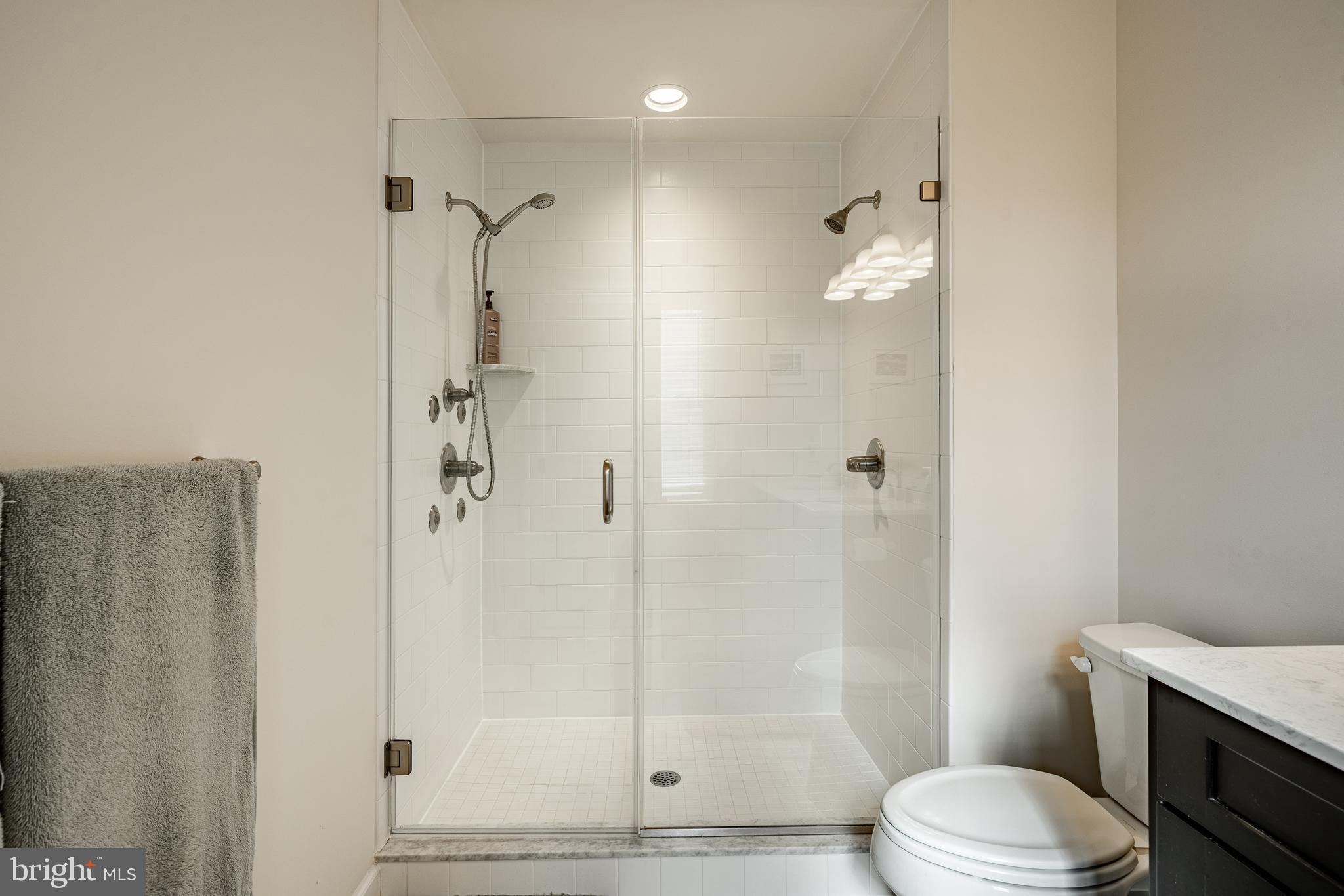 408 Atwater Drive Malvern, PA 19355 - Photo 21 of 49 a bathroom with a shower a toilet and sink