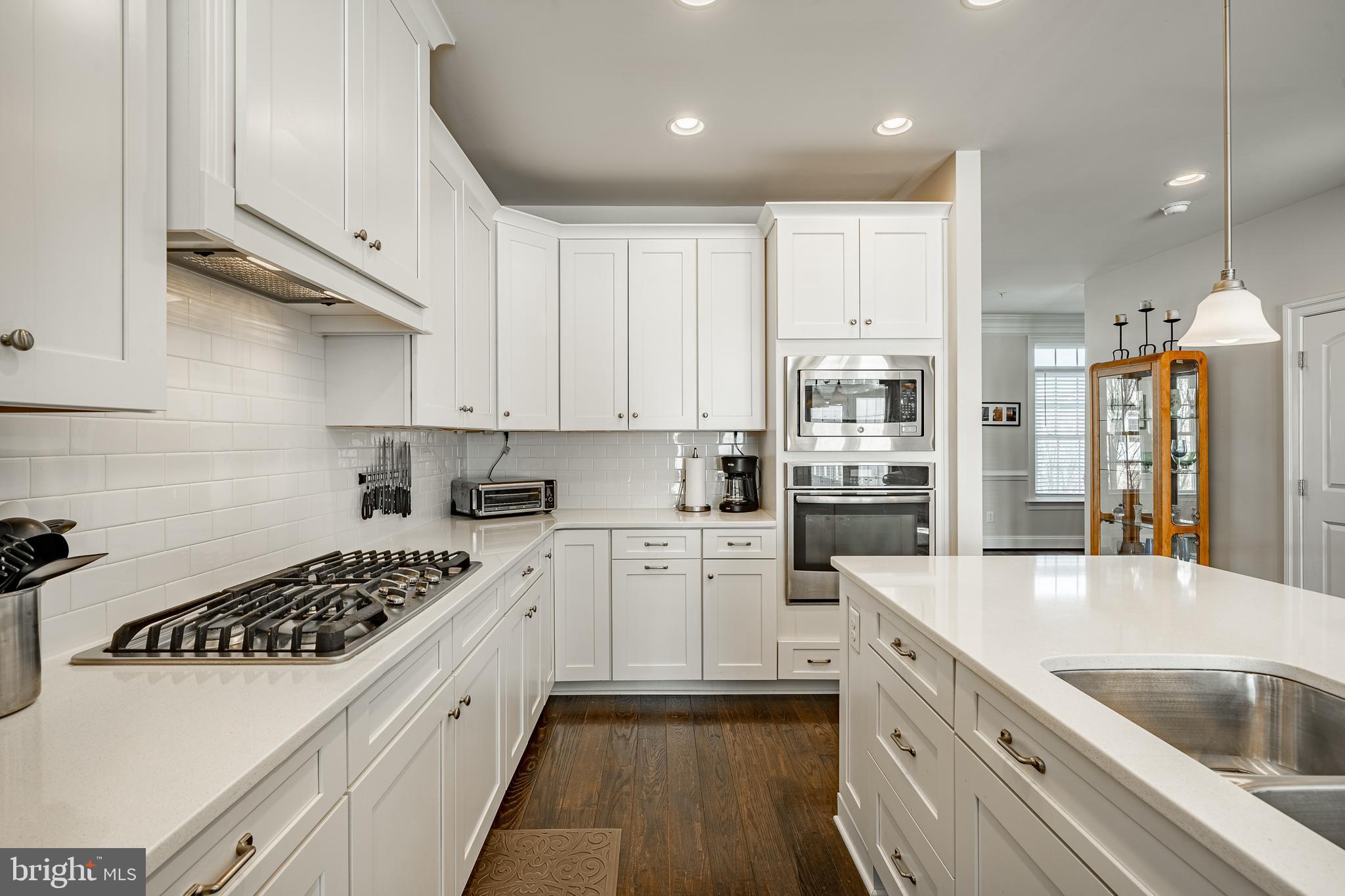 408 Atwater Drive Malvern, PA 19355 - Photo 5 of 49 a kitchen with a sink a stove and cabinets