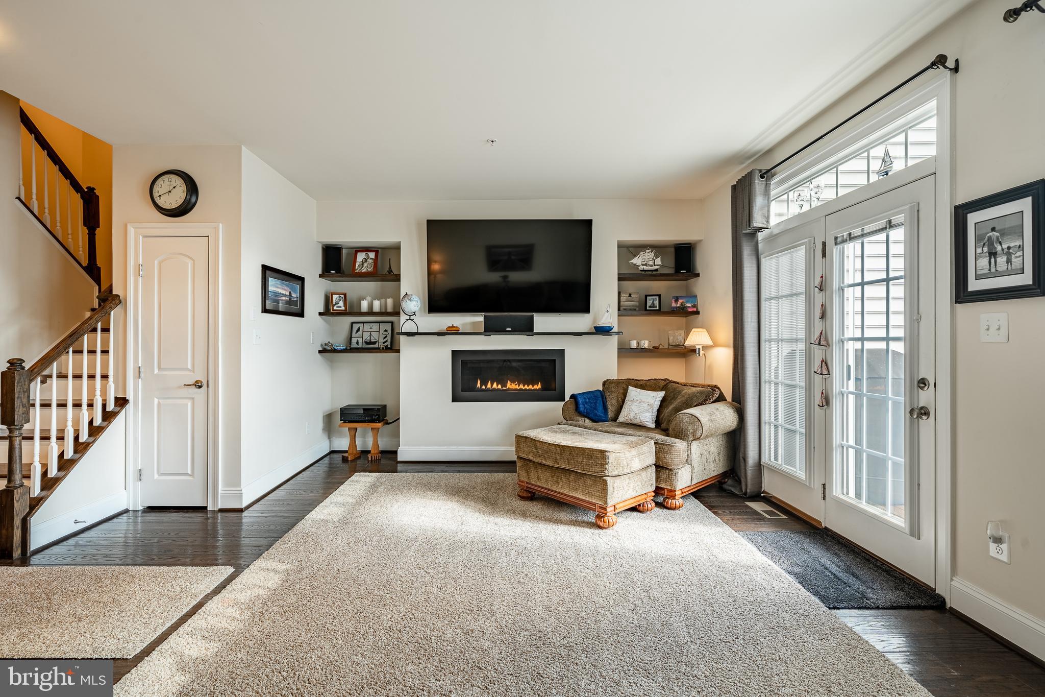 408 Atwater Drive Malvern, PA 19355 - Photo 8 of 49 a living room with furniture and a flat screen tv