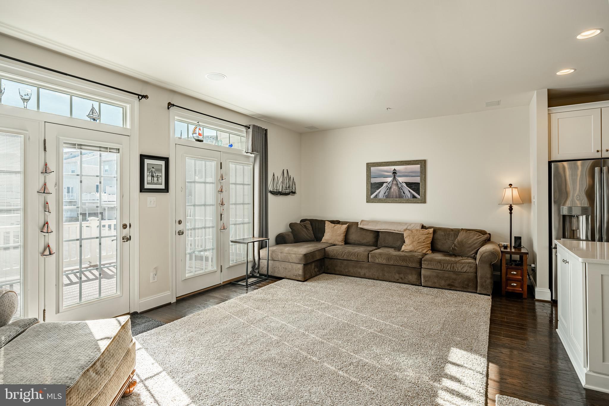 408 Atwater Drive Malvern, PA 19355 - Photo 9 of 49 a living room with furniture and a flat screen tv