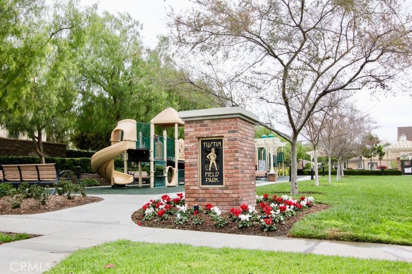 376 Aviator Lane South Tustin, CA 92782 - Photo 18 of 19 a front view of a house with a garden and trees