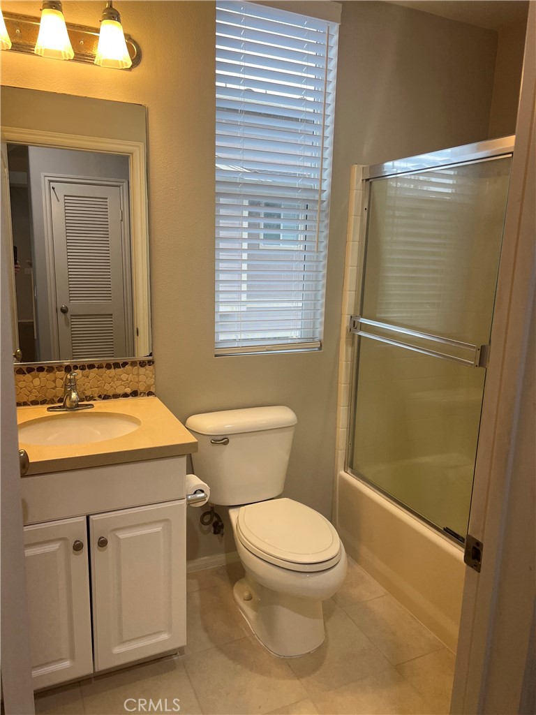 376 Aviator Lane South Tustin, CA 92782 - Photo 8 of 19 a bathroom with a sink a toilet and shower