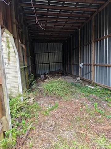 a view of backyard with pathway