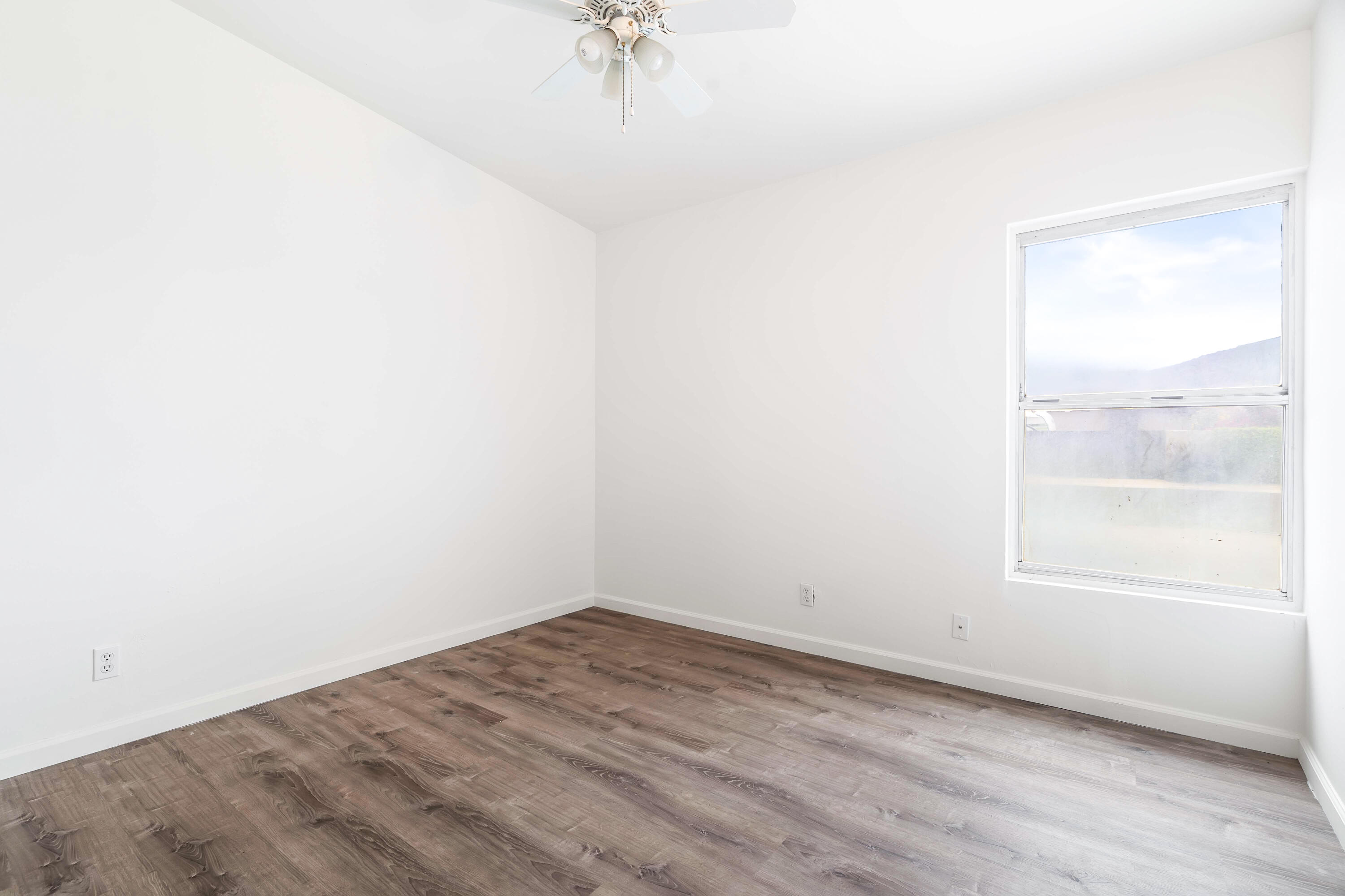 43831 Joshua Road Palm Desert, CA 92260 - Photo 13 of 42 an empty room with a window