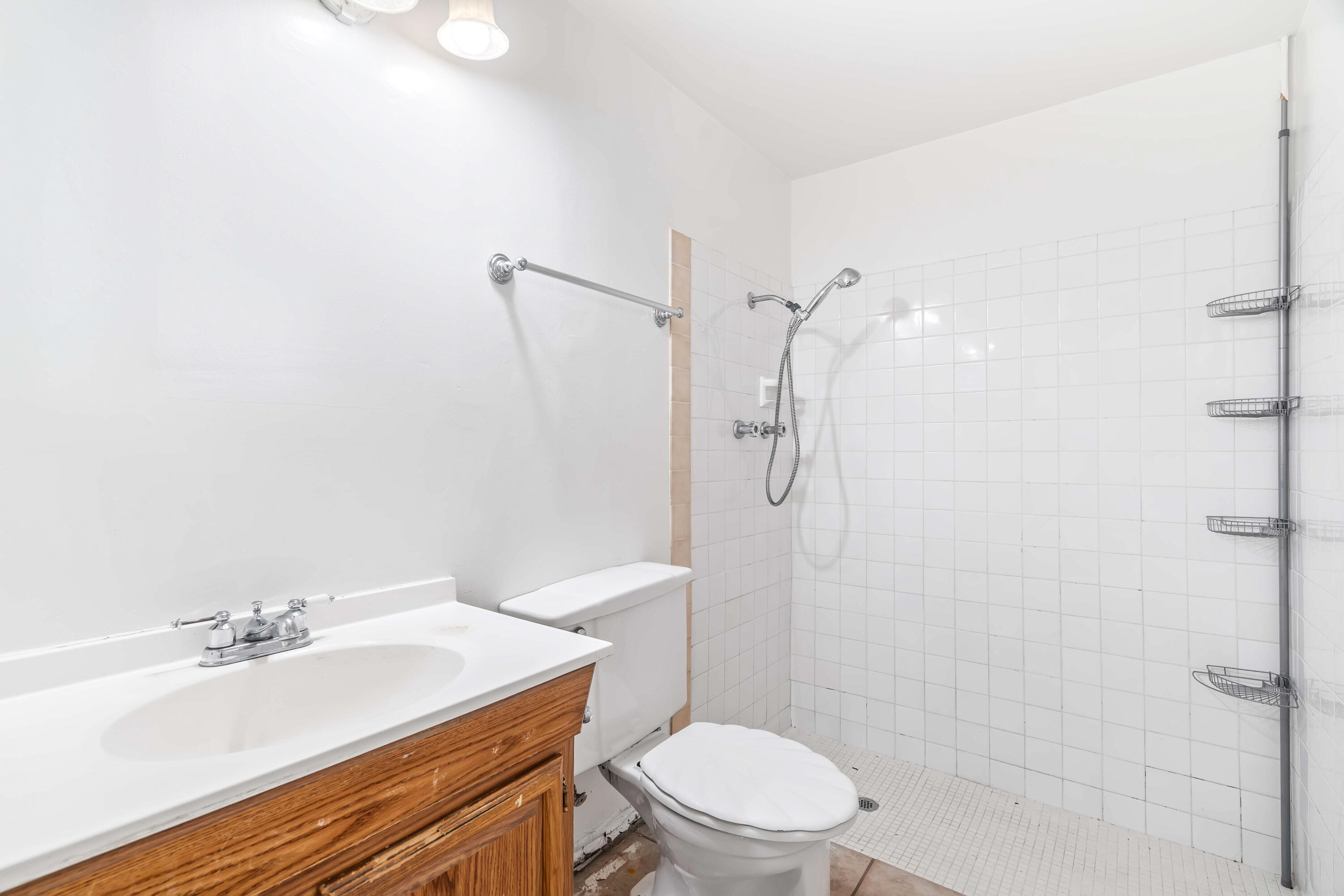 43831 Joshua Road Palm Desert, CA 92260 - Photo 20 of 42 a bathroom with a granite countertop toilet sink and shower