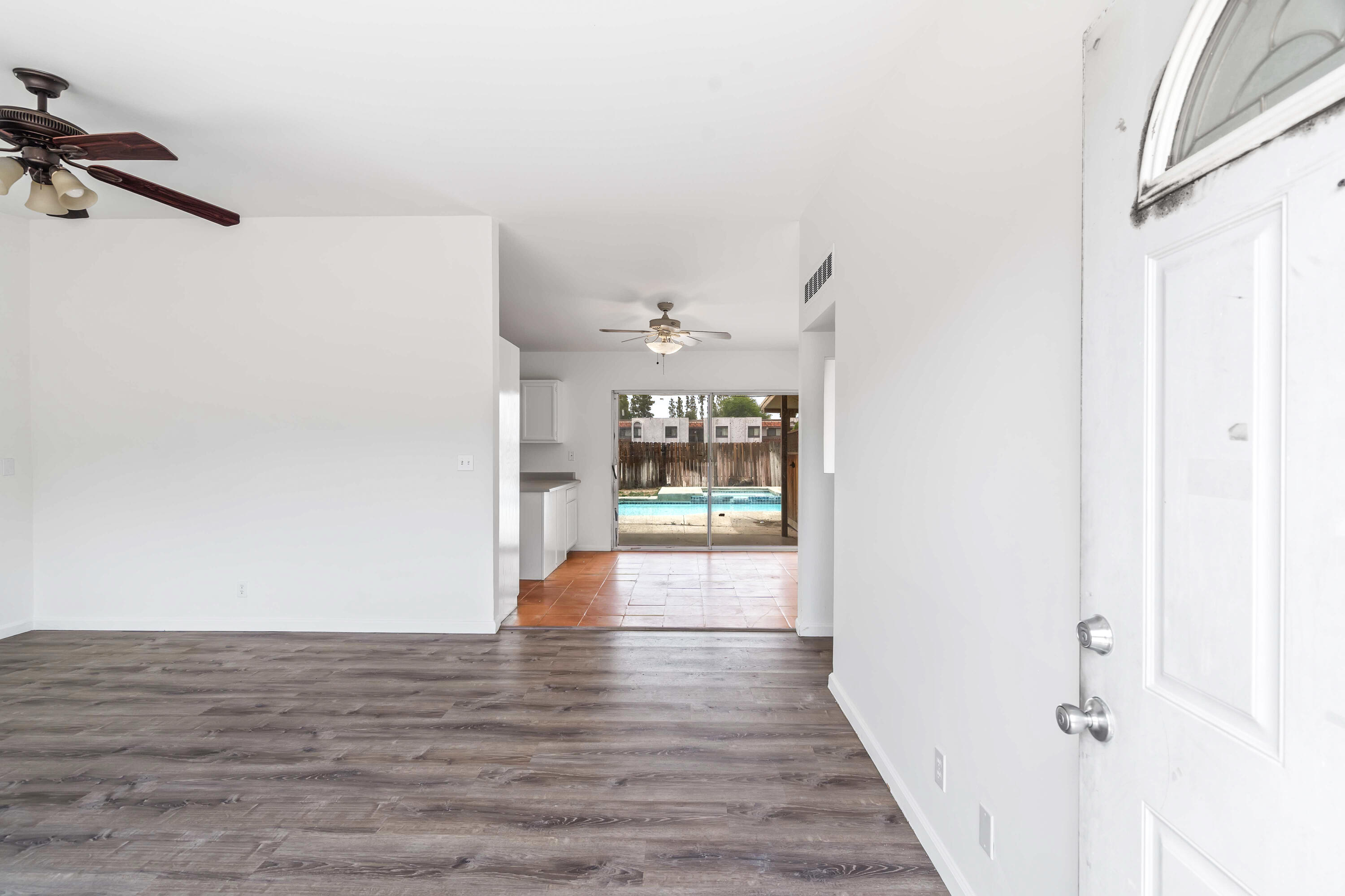 43831 Joshua Road Palm Desert, CA 92260 - Photo 2 of 42 a view of empty room with wooden floor